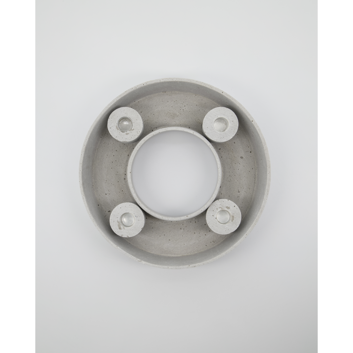 Portavelas de cemento gris